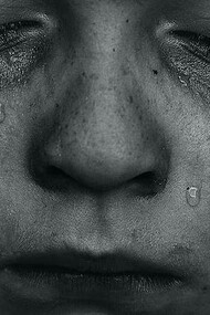 A young boy consumed by shame