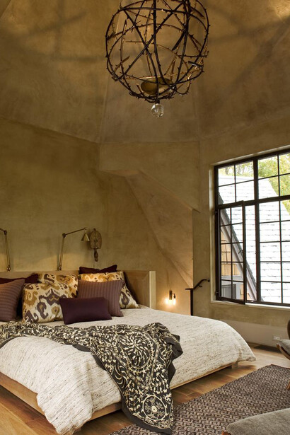 This third floor master bedroom is designed to be an 'escape from it all' · Glenn Gissler Design