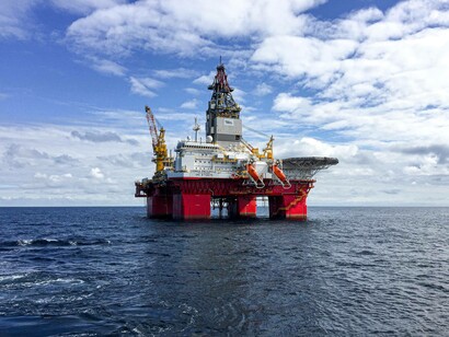 An offshore oil rig in the middle of the Pacific Ocean