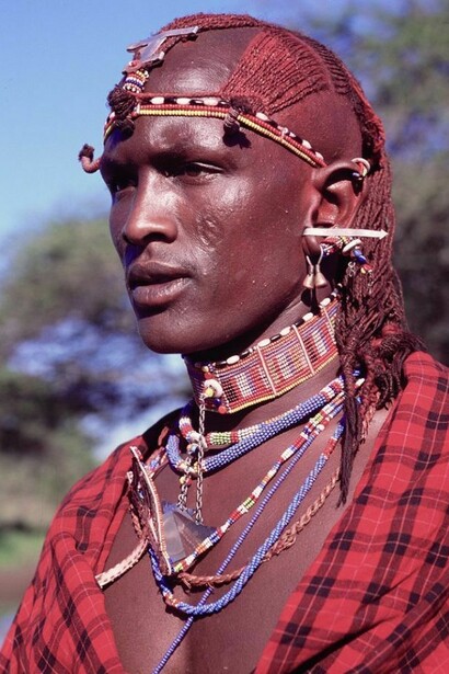Foreground of a Massai warrior