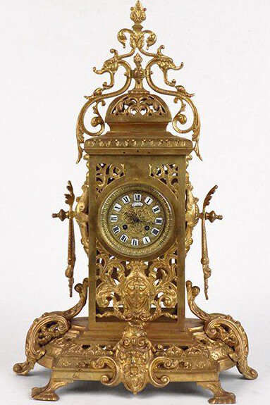Reloj en bronce y hierro del siglo XIX, Francia