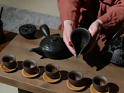 Tea, meticulously brewed and presented in accordance with time-honored traditions