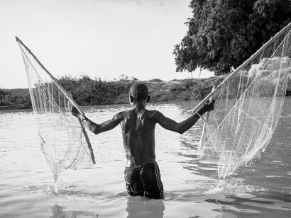 Traditional fishing scene in Argungu, Kebbi State, Nigeria