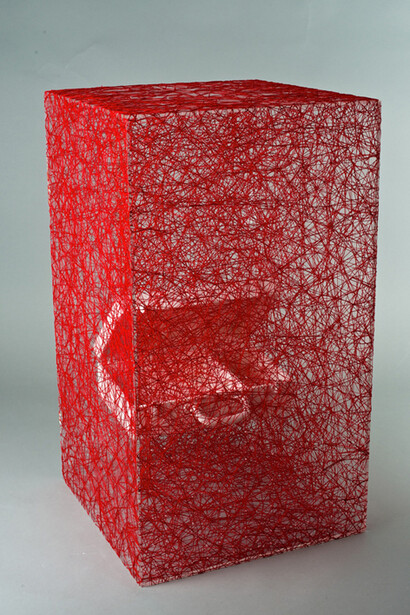 Chiharu Shiota, State of Being (Suitcase), 2014, acrylic box, suitcase and red thread, 80 x 45 x 45 cm - 31 1/2 x 17 3/4 x 17 3/4 in. Unique, © Sunhi Mang Courtesy Chiharu Shiota and Galerie Daniel Templon