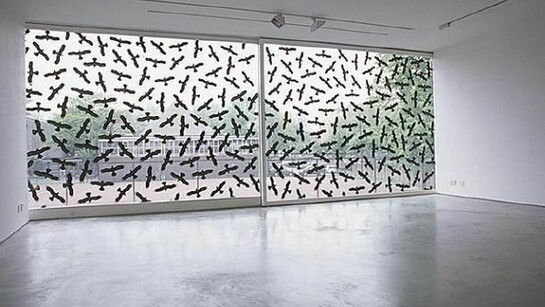 Ceal Floyer, Warning Birds, 2002, Self-adhesive 'warning birds' on window, Dimensions variable, Courtesy the artist and Lisson Gallery, London & Esther Schipper, Berlin & 303 Gallery, New York