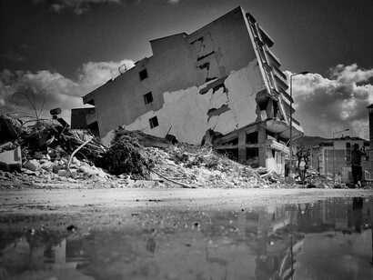 A building collapses due to an earthquake