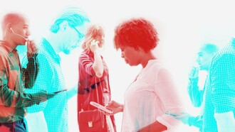 Individuals seemingly engrossed in their smartphones, representing pervasive connectivity and a culture of individuation in the evolving network society