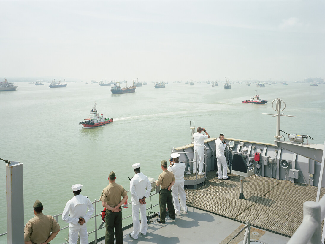 An-My Lê, Manning the Rail, USS Tortuga, Java Sea, 2010, Archival pigment print, 40 x 56 1/2 inches, Edition of 5, Image courtesy of the artist and Murray Guy, New York

