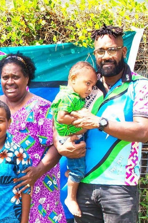 A gathering by the Torres Strait island flag, Queensland, Australia