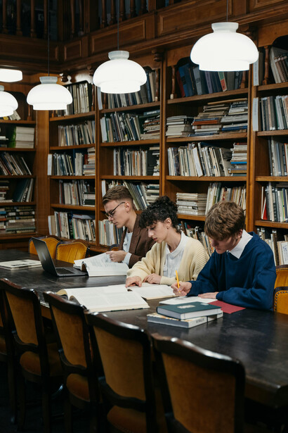 Students studying together in a library