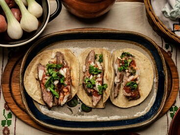 Freshly assembled tacos showcasing regional ingredients, reflecting how local cuisine preserves cultural heritage