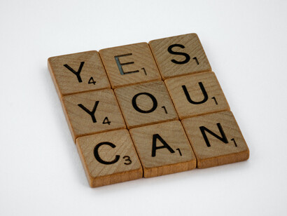 Scrabble pieces showing how believing in yourself is important