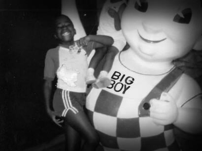 Author's son stands with the Big Boy statue, a fond memory she had traveling, once across the Mason-Dixon line of the USA