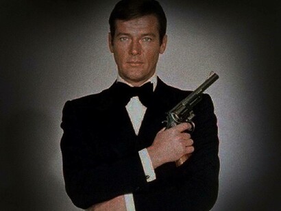 Roger Moore posing as the Bond in a traditional manner