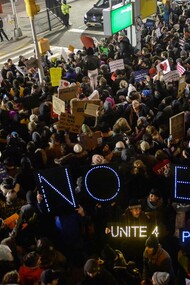 Reaction at JFLK airport to an American Judge's decision to overturn President Trump's motion to ban Muslims from immigrating to the United States 