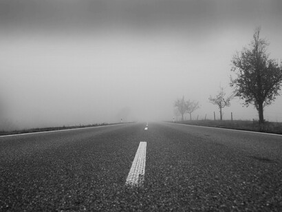 The road not taken has a foggy blur that is meant to be unseen from a distance but as we move closer the picture becomes clearer