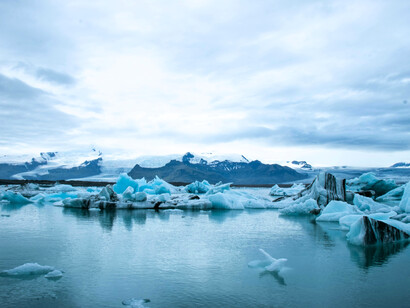 Slowly melting glaciers and snow-capped mountains, underscoring how it is necessary to preserve and protect the ice by practicing regenerative travel