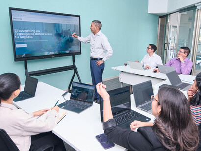 Business meeting and presentation in a modern office focused on development and business courses