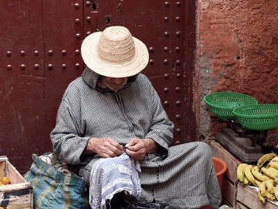 The fruit stall he tends to represents the abundance shared during Ramadan, where charitable acts such as providing Iftar meals and offering food to the less fortunate become essential practices of the season