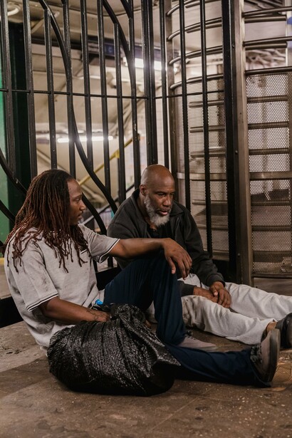 Two men who are struggling with poverty sat together. The bets placed only on changing the system were lost bets