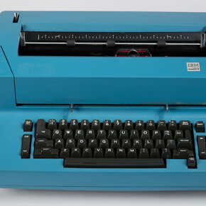 CORRECTING SELECTRIC II, MODEL 895 TYPEWRITER AND TYPING ELEMENTS; 1973; Designed by Eliot Noyes (American, 19101977); Manufactured by IBM (Armonk, New York, USA); Aluminum, steel, molded plastic; typewriter: 18 × 51 × 38 cm (7 1/16 × 20 1/16 × 14 15/16 in.); typing element (each): Diam. 3.8 cm (1 1/2 in.); Gift of Robert M. Greenberg, 2017-51-10-a/g