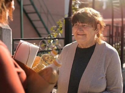 Delivering supplies to elderly neighbors as a gesture of generosity and reciprocity, highlighting the importance of giving and receiving in acts of kindness