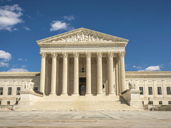 The U.S. Supreme Court building serving as a pillar of justice, reflecting the stability and legitimacy of a well-ordered legal system