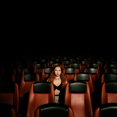 In the stillness of the theater, one viewer reminds us of how cinema speaks, even when voices are silenced