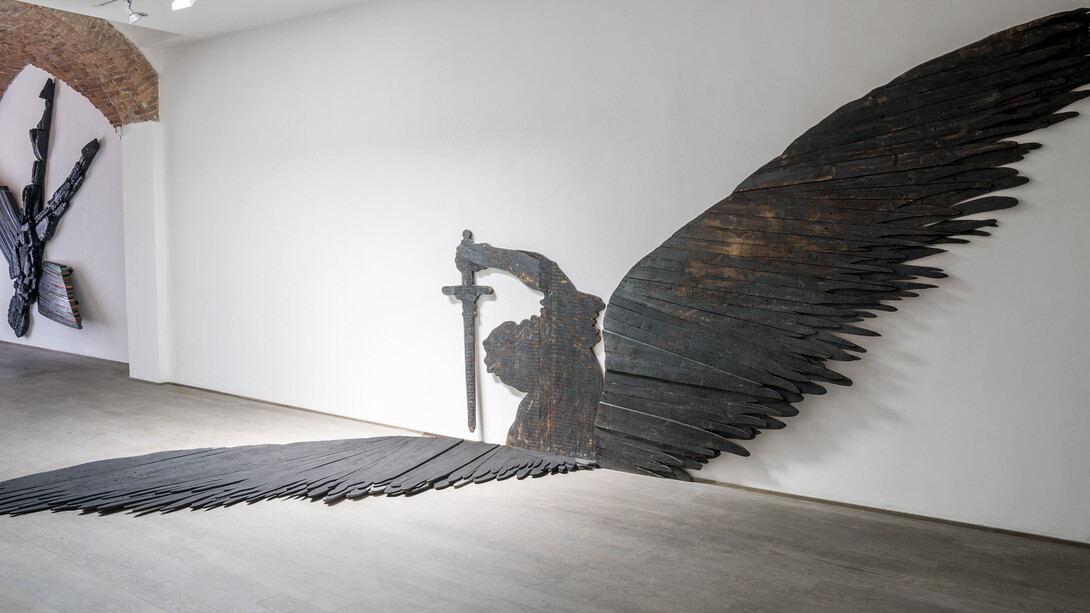L’Angelo sterimatore,1990,painted wood, cm 290 x 503 x 345. Courtesy of Flora Bigai 