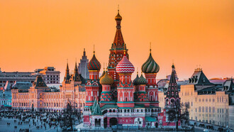 The vibrant and majestic Saint Basil's Cathedral in the Red Square of Moscow captures the essence of the city's history, offering a stunning blend of artistry and architectural grandeur
