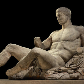 A figure of a naked man, possibly Dionysos. Marble statue from the East pediment of the Parthenon. Designed by Phidias, Athens, Greece, 438BC-432BC. © The Trustees of the British Museum
