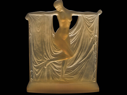 René Lalique, Designer, Lalique et Cie,, Manufacturer, Suzanne
Statuette: transparent butterscotch yellow glass; mold-pressed, acid-etched.
Designed 1925