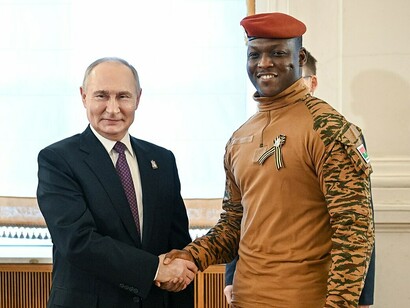 Russian President Vladimir Putin and Burkina Faso President Ibrahim Traoré at the Kremlin during a celebratory concert for foreign heads of state attending the 80th anniversary commemorations of Victory in the Great Patriotic War, 2025