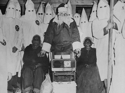 Ku Klux Klan with two old slaves 