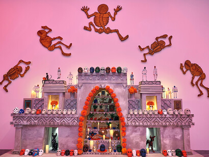 Isabelle honors the Dia de los Muertos as a theme in this exhibition with a beautifully decorated altar and wall-mounted floating skeletons
