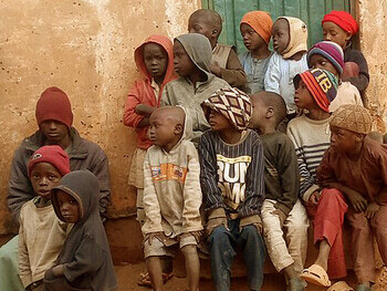Parents send their children to beg in villages and towns across northern Nigeria, with some children being Nigerian and others coming from the Republic of Niger. This practice is an old tradition among the Hausa and other tribes in both Nigeria and Niger