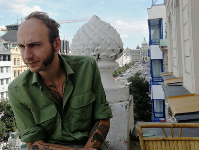 Anatol Svahilec on his balcony on Wenceslas square in the center of Prague, photo by Martina Kroa