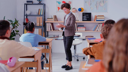 As the teacher elaborates on the limitations of artificial intelligence, students engage in a dialogue about the unique role of human needs in shaping neural networks and creativity