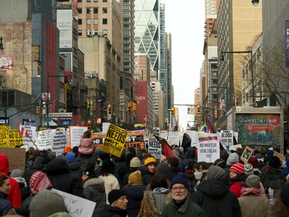 Protestors gather in Times Square against the invasion of Venezuela and kidnapping of Nicolás Maduro by the U.S.