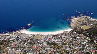 Camps Bay, an affluent suburb of Cape Town, South Africa, as seen from Table Mountain