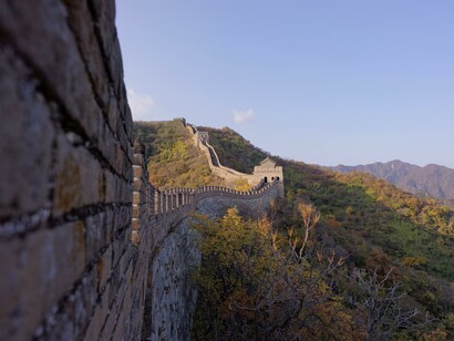 The very basic idea of belonging to united territory protected by wall evolved to idea of unique central country led by a magnificent ruler