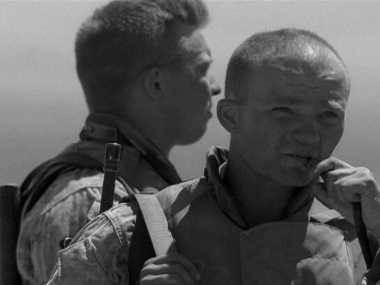 An-My Lê, Film still from 29 Palms, 2005, 2-channel DVD projection, 35 mm transferred to DVD, black-and-white, 7 minute loop, Image courtesy of the artist and Murray Guy, New York