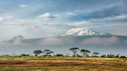 Mount Kilimanjaro, how much smaller and greyer the glacier has become