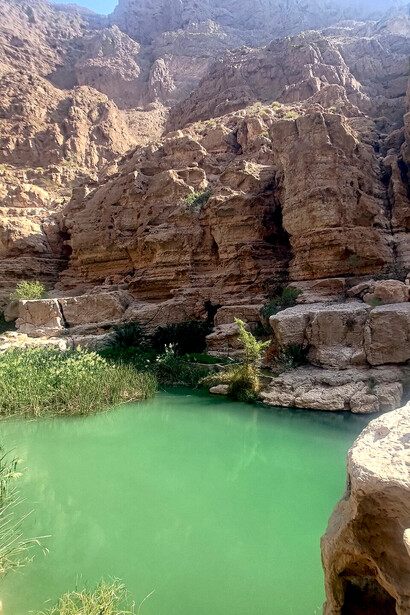 Wadi Shab in Oman is considered a must-visit destination for its stunning natural beauty and rewarding hike