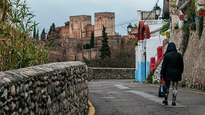 Man roams the streets of Grenada, Spain