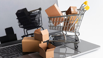 Online shopping epitomizes convenience culture, as illustrated by a mini trolley full of shopping boxes on a laptop, showcasing the impact of convenient lifestyles, technologies, and approaches