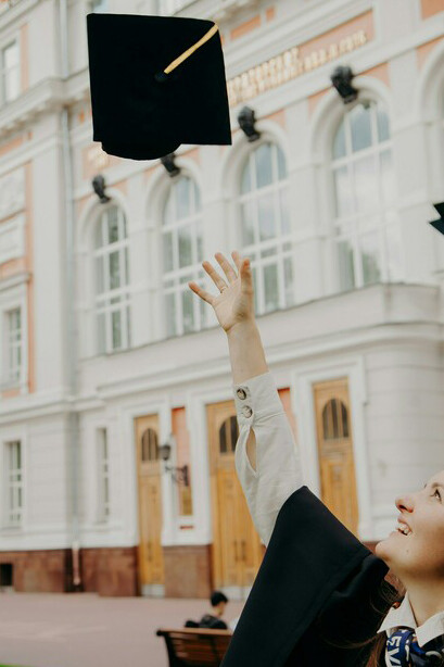 A student celebrating her graduation-modern education is devoid of values