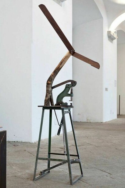 Jimmie Durham, This Should Explain, 2012, industrial machine, olive and tropical wood branches, 210 x 65 x 70 cm