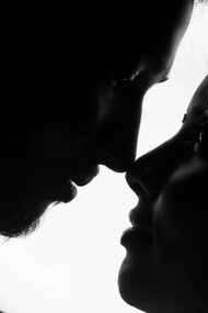 A woman and man look at each other, searching for connection beyond words