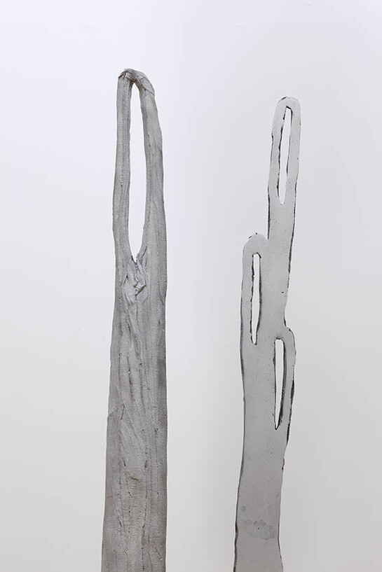 Alice Channer, Deepwater Horizon , 2014, Mirror polished and laser cut stainless steel, Super-Matt laquered and laser cut stainless steel, Cast and mirror
polished aluminium, Accordion pleated snake skin heat-embossed stretch polyester, Stretch alligator print, maxi-skirt, Pelletised HDPE, Stretch snake print vest top, 150 x 437.5 x 114 cm (59 x 172 3/16 x 44 7/8 inches), FXP Photography, London, Courtesy of The Approach, London